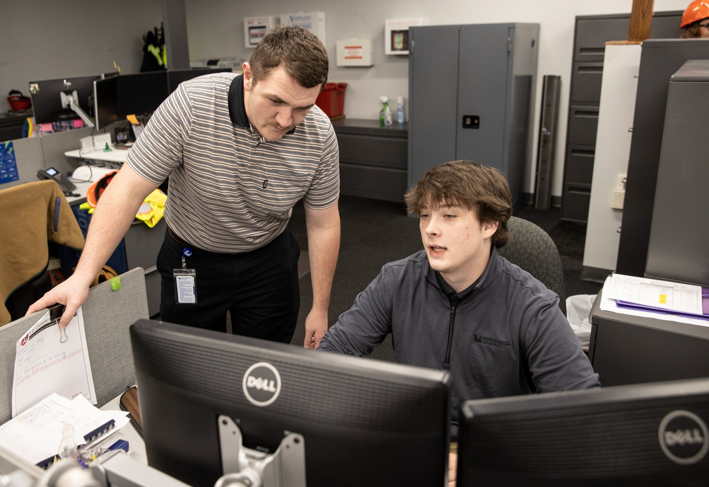 Worthington Steel employees collaborating in an office environment.