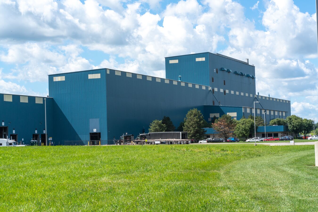 Exterior view of Worthington Steel's Delta, Ohio facility, showcasing large-scale steel processing operations.