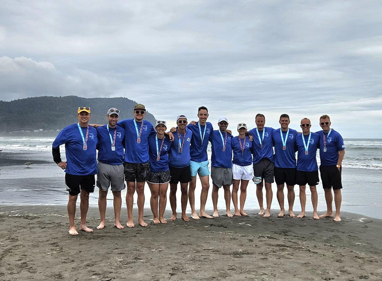Worthington Steel employees in Oregon running a marathon race.