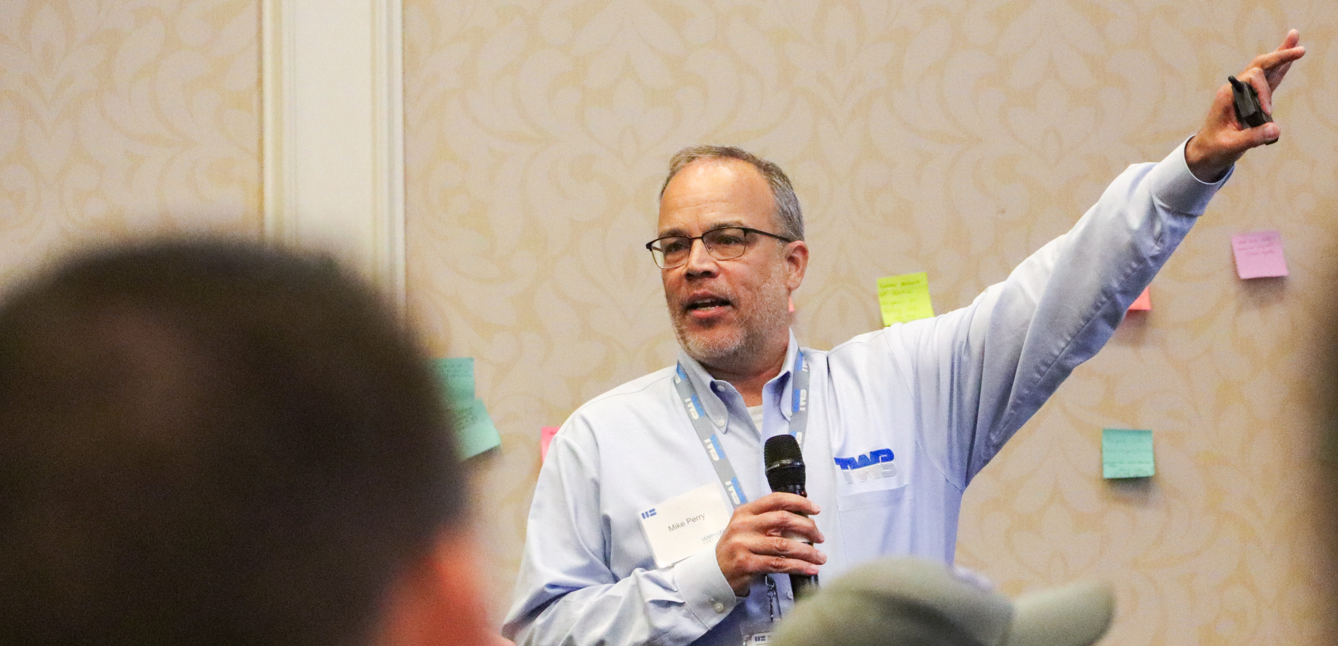 Worthington Steel, TWB leader presenting during a meeting.