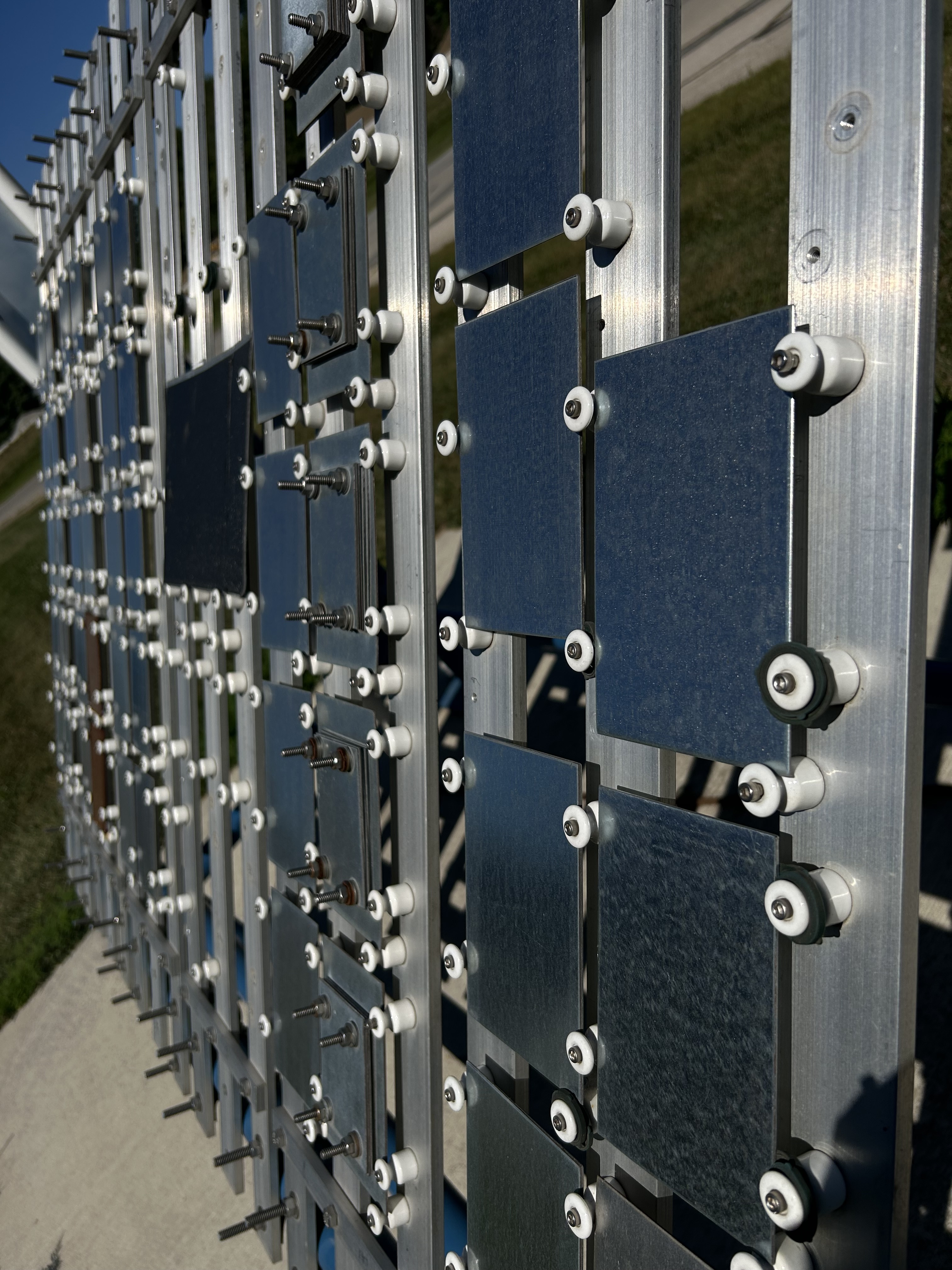 A closeup of the steel coated samples on the testing station.