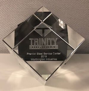 Worthington steel accepting Trinity Highway Service award for Service Center Supplier of the year.