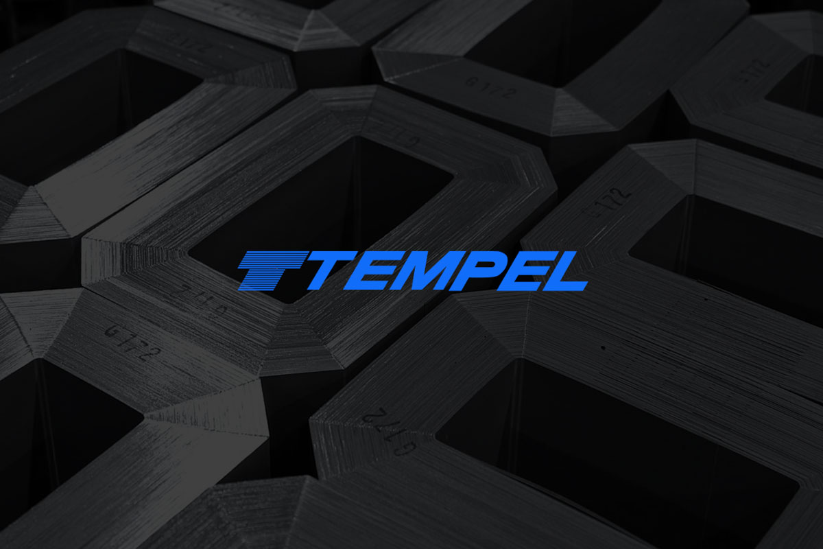 Tempel steel logo layered on electric steel laminations.