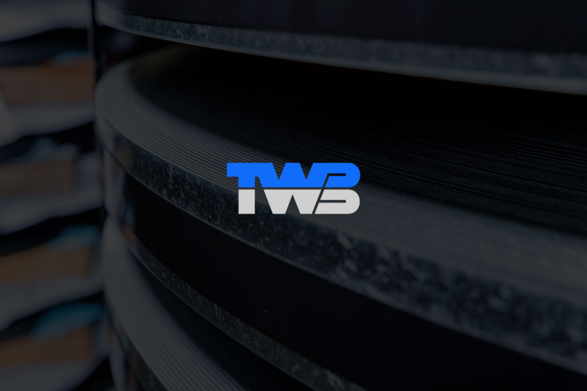 TWB Company logo over processed steel.